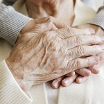 cropped shot of elderly female's hands.